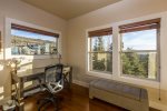 Light and bright office with direct access to back deck in master suite. 